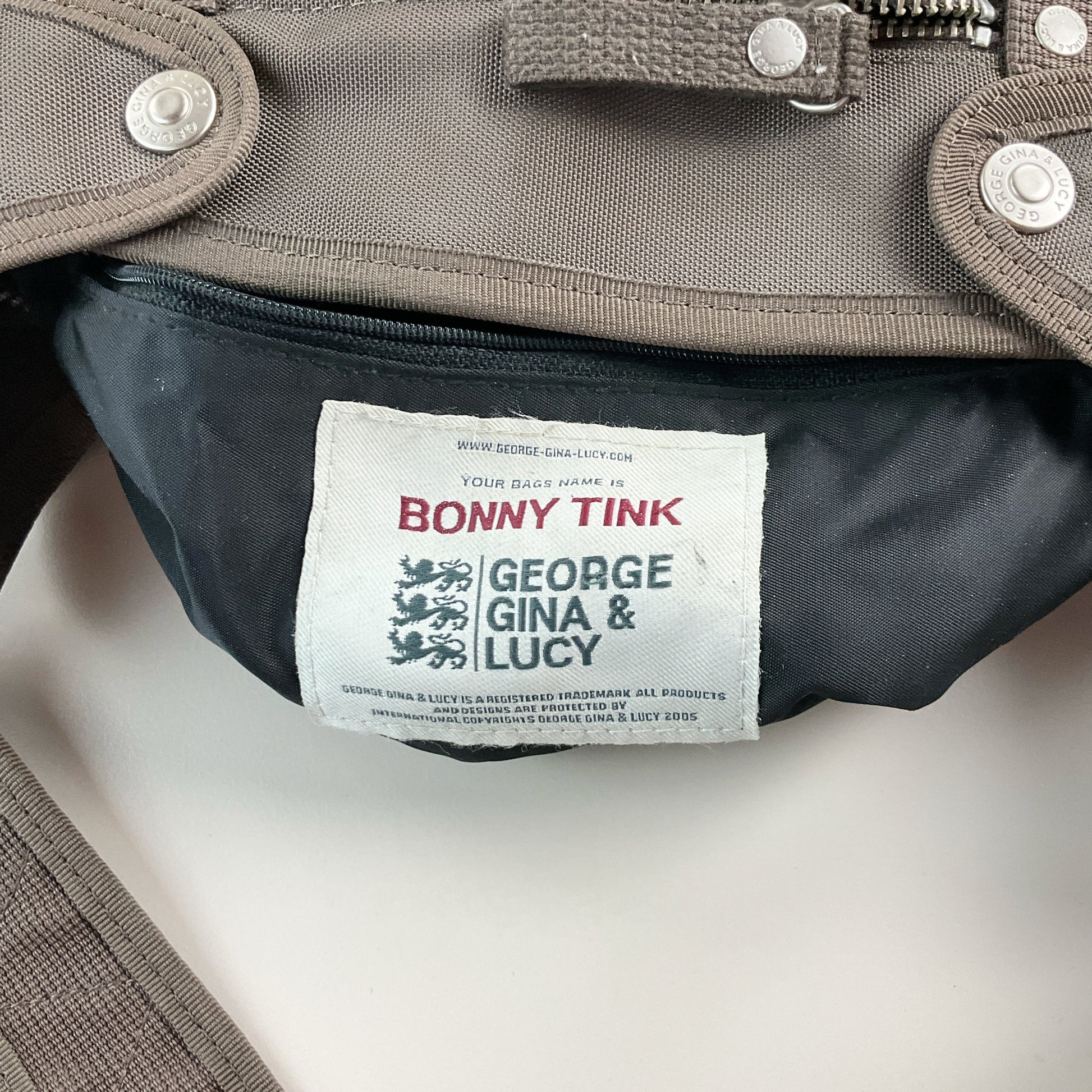George Gina Lucy Bonnie Tink Tasche Braun - Markenlabel