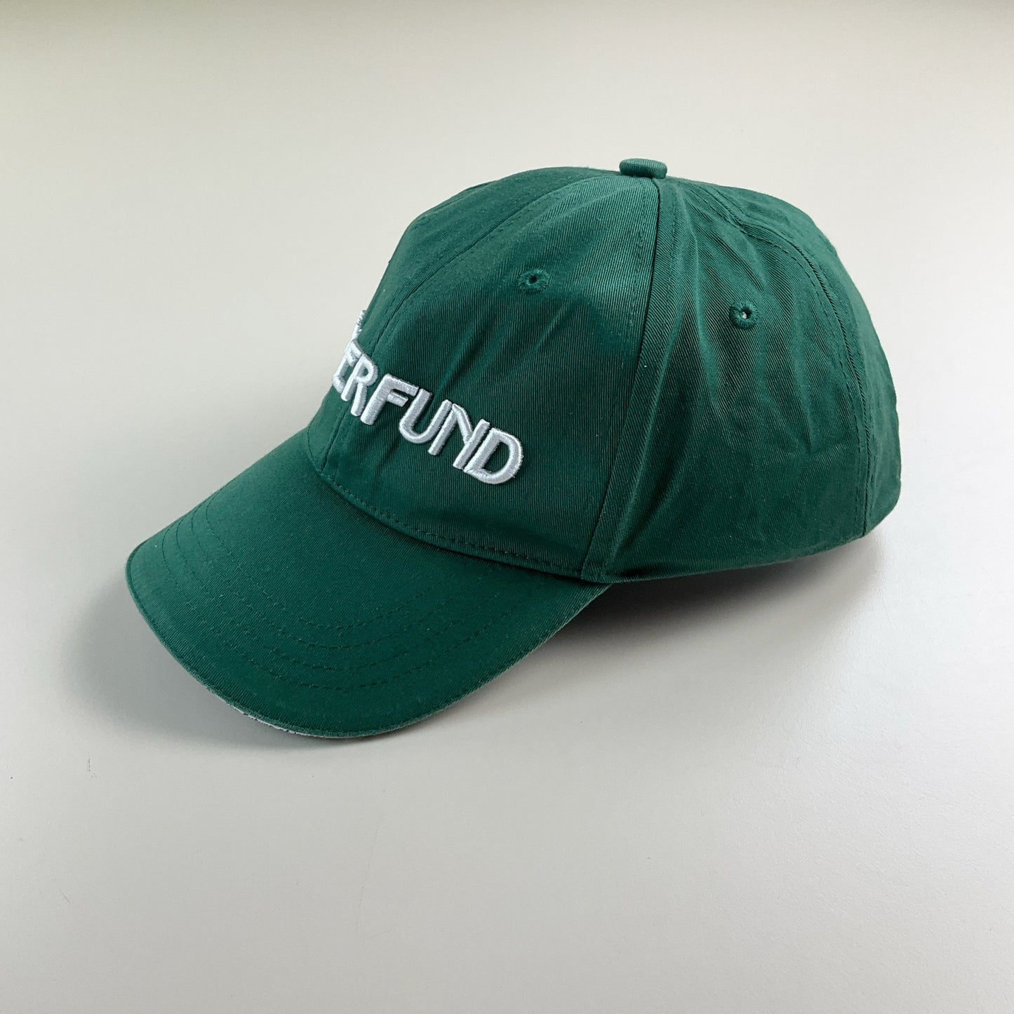 Superfund Cap Grün - Detailansicht Logo